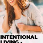 woman smiling into camera happy and enjoying life intentional living meaning and benefits