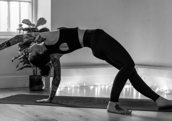 black and white image wild thing yoga pose yoga and grief