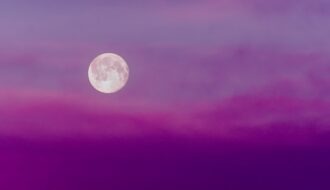 featured image of blog post full moon affirmations image featuring a full moon in purple sky setting