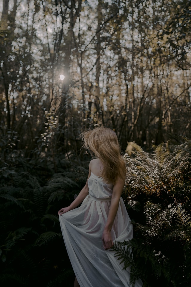 full moon affirmations female blonde pictures in forrest wearing a white dress