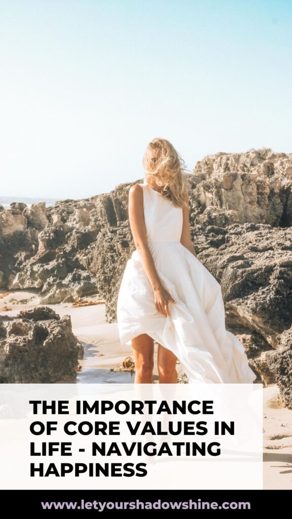 image is showing a woman at the beach posing into the camera woman is wearing a white dress blog post is about the importance of core values in life