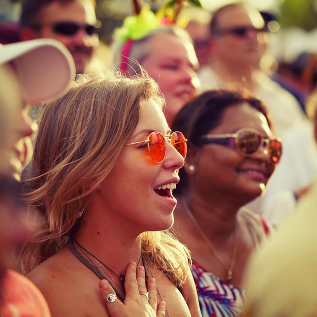 people at festival enjoying music 12 self-care ideas for summer