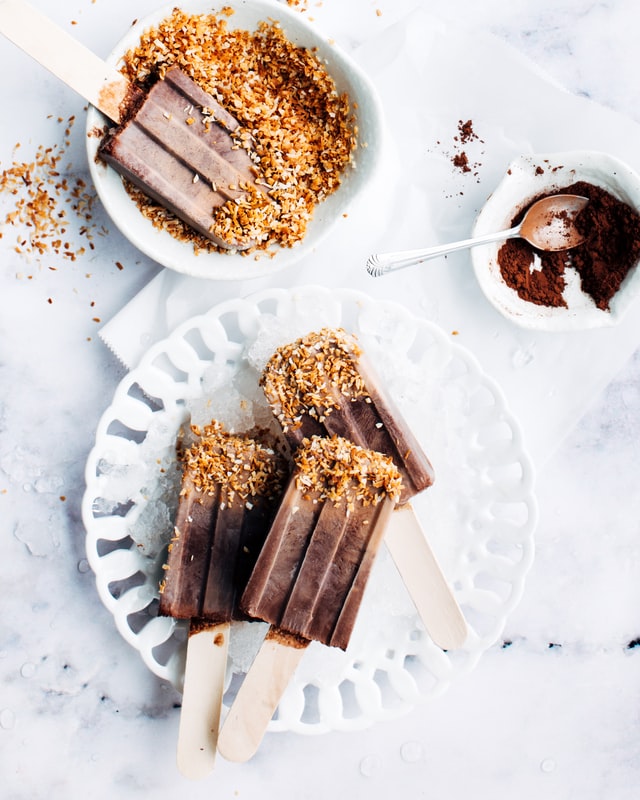 homemade chocolate ice cream with crispy toppings on stick self-care ideas for summer