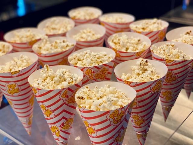 small popcorn bags displayed ready to grab 12 self-care ideas for summer outside cinema