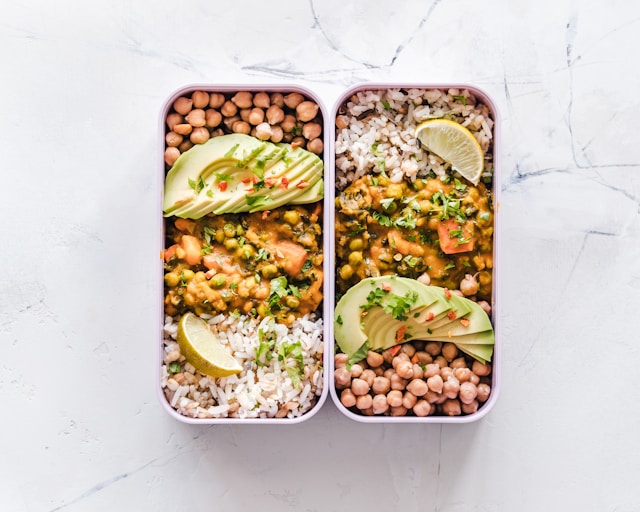 image showing two food containers featuring meal prep for the next day blog post is about crafting an evening routine