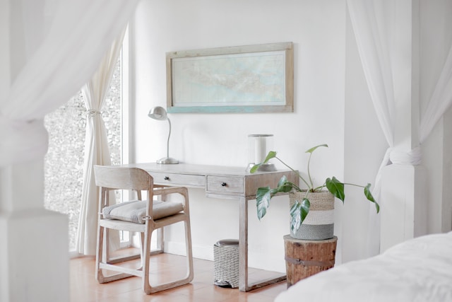 picture showing a minimalist home in white and light colours blog post is about mindful glow up tips