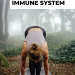 Pinterest pin image showing a woman in standing forward fold in a forrest setting blog post is about how yoga helps to boost the immune system