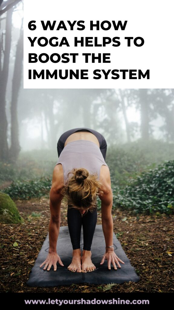 Pinterest pin image showing a woman in standing forward fold in a forrest setting blog post is about how yoga helps to boost the immune system