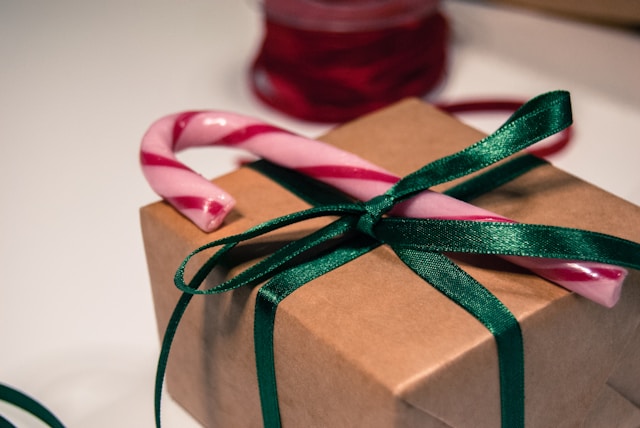 image shows a close up of a beautifully wrapped present blog post is about navigating the festive season