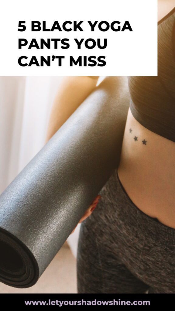 Pinterest pin image showing close up of a woman wearing a black yoga outfit and carrying a black yoga mat blog post is about the best black yoga pants from Amazon