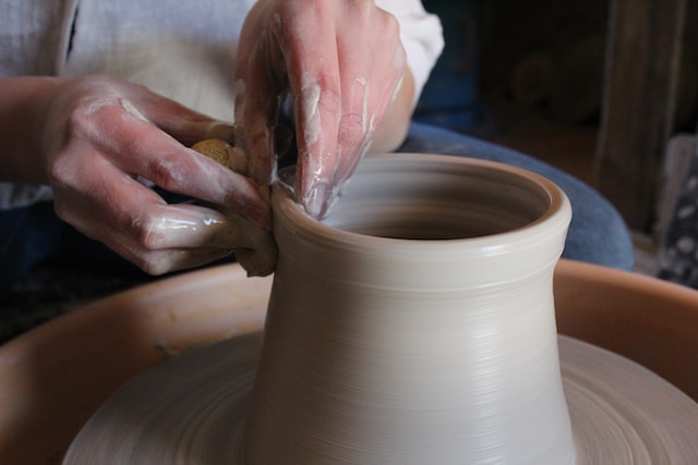 close up of female hands crafting pottery mindfulness and grounding get creative