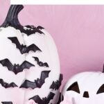 Pinterest pin image showing a selection of pumpkins and bats in pink and black colours the blog post is about spooky home decor you will want to keep forever